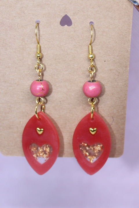 Imbedded Gold Hearts in Pink Resin