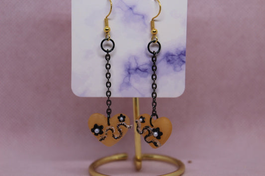 Gold Heart with Black Snake
